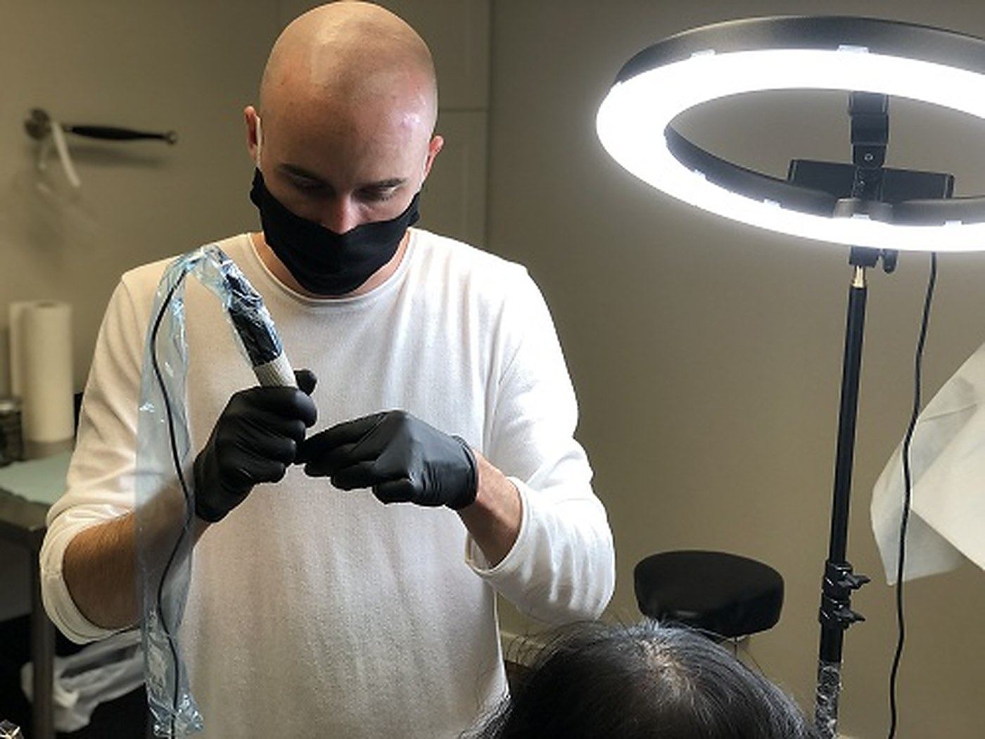 Hairline SMP practitioner performing scalp micropigmentation in Zirakpur clinic